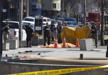 Ten people were killed on Yonge Street between Finch and Sheppard Avenues in Toronto's North York area after a van struck dozens of people Monday, April 23, 2018. (Stan Behal/Toronto Sun/Postmedia Network)