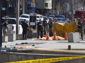 Ten people were killed on Yonge Street between Finch and Sheppard Avenues in Toronto's North York area after a van struck dozens of people Monday, April 23, 2018. (Stan Behal/Toronto Sun/Postmedia Network)
