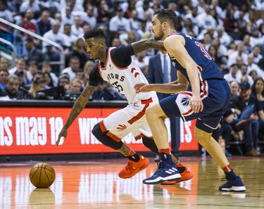 Toronto Raptors Delon Wright during Eastern Conference Playoff Game 1 first half action against Washington Wizards Tomas Satoransky at the Air Canada in Toronto, Ont. on Saturday April 14, 2018. Ernest Doroszuk/Toronto Sun/Postmedia Network
