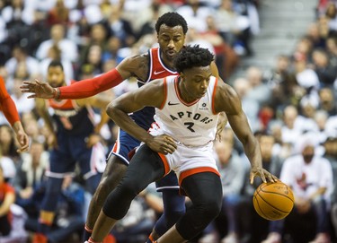Toronto Raptors OG Anunoby during Eastern Conference Playoff Game 1 second half action against Washington Wizards John Wall at the Air Canada in Toronto, Ont. on Saturday April 14, 2018. Ernest Doroszuk/Toronto Sun/Postmedia Network
