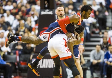 Toronto Raptors OG Anunoby during Eastern Conference Playoff Game 1 second half action against Washington Wizards John Wall at the Air Canada in Toronto, Ont. on Saturday April 14, 2018. Ernest Doroszuk/Toronto Sun/Postmedia Network