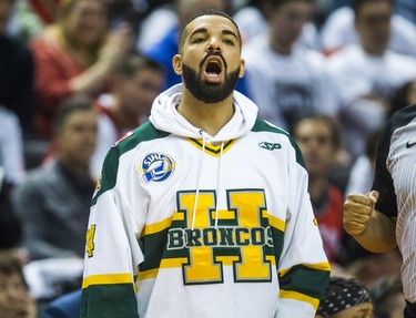 Rapper Drake wears a Humboldt Broncos jersey while cheering on Toronto Raptors during Eastern Conference Playoff Game 1 second half action against Washington Wizards at the Air Canada in Toronto, Ont. on Saturday April 14, 2018. Ernest Doroszuk/Toronto Sun/Postmedia Network