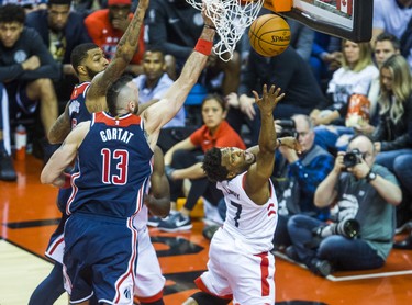 Toronto Raptors Kyle Lowry during Eastern Conference Playoff Game 1 second half action against Washington Wizards Marcin Gortat at the Air Canada in Toronto, Ont. on Saturday April 14, 2018. Ernest Doroszuk/Toronto Sun/Postmedia Network