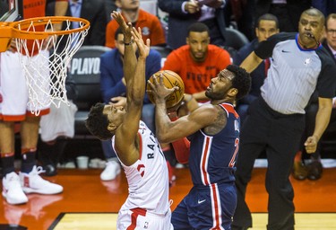 Toronto Raptors Kyle Lowry during Eastern Conference Playoff Game 1 second half action against Washington Wizards John Wall at the Air Canada in Toronto, Ont. on Saturday April 14, 2018. Ernest Doroszuk/Toronto Sun/Postmedia Network
