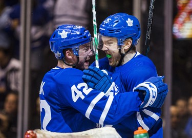 Toronto Maple Leafs James van Riemsdyk (right) and Tyler Bozak celebrate a first period Round 1 Game 3 goal against the Boston Bruins at the Air Canada Centre in Toronto, Ont. on Monday April 16, 2018. Ernest Doroszuk/Toronto Sun/Postmedia Network