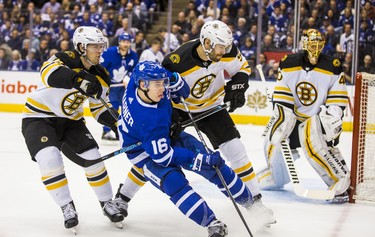 Toronto Maple Leafs Mitch Marner during first period Round 1 Game 3 action against Boston Bruins Torey Krug (left) and Adam McQuaid at the Air Canada Centre in Toronto, Ont. on Monday April 16, 2018. Ernest Doroszuk/Toronto Sun/Postmedia Network