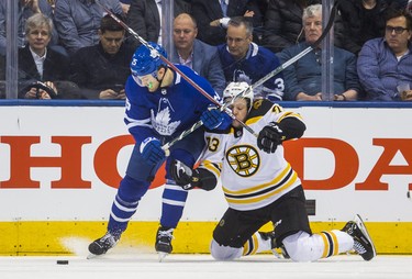 Toronto Maple Leafs James van Riemsdyk during second period Round 1 Game 3 action against Boston Bruins Charlie McAvoy at the Air Canada Centre in Toronto, Ont. on Monday April 16, 2018. Ernest Doroszuk/Toronto Sun/Postmedia Network