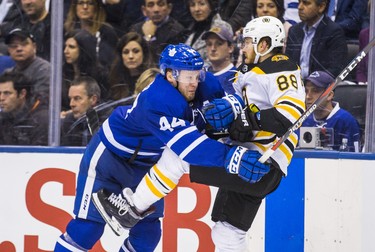 Toronto Maple Leafs Morgan Rielly during third period Round 1 Game 3 action against Boston Bruins David Pastrnak at the Air Canada Centre in Toronto, Ont. on Monday April 16, 2018. Ernest Doroszuk/Toronto Sun/Postmedia Network