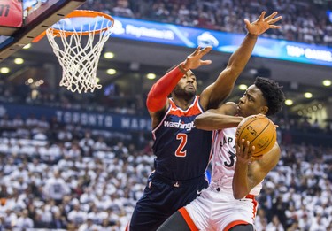 Toronto Raptors OG Anunoby during 1st half action against the Washington Wizards ohn Wall in Game 2 of the Eastern Conference - First Round at the Air Canada Centre in Toronto, Ont. on Tuesday April 17, 2018. Ernest Doroszuk/Toronto Sun/Postmedia Network