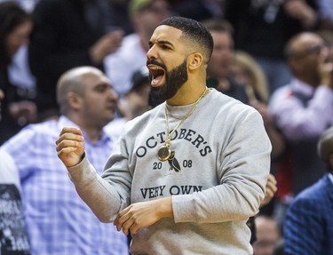 Rapper Drake cheers on the Toronto Raptors during 2nd half action against the Washington Wizards in Game 2 of the Eastern Conference - First Round at the Air Canada Centre in Toronto, Ont. on Tuesday April 17, 2018. Ernest Doroszuk/Toronto Sun/Postmedia Network