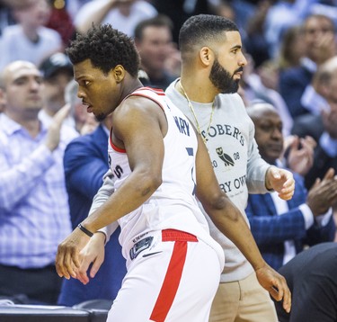 Toronto Raptors Kyle Lowry and rapper Drake during 2nd half action against the Washington Wizards in Game 2 of the Eastern Conference - First Round at the Air Canada Centre in Toronto, Ont. on Tuesday April 17, 2018. Ernest Doroszuk/Toronto Sun/Postmedia Network