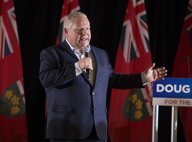 Ontario PC leader Doug Ford addresses supporters at a campaign rally at La Roya Banquet Hall in Ajax, Ont. on Wednesday April 18, 2018. Ernest Doroszuk/Toronto Sun/Postmedia Network