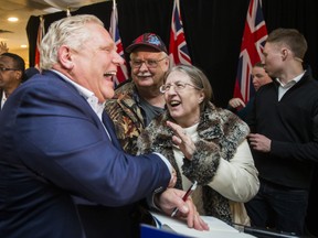 Ontario PC leader Doug Ford meets with supporters after speaking at a campaign rally at La Roya Banquet Hall in Ajax, Ont. on Wednesday April 18, 2018. Ernest Doroszuk/Toronto Sun/Postmedia Network