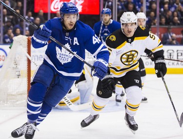 Toronto Maple Leafs Tyler Bozak during first period Round 1 Game 4 playoff action against the Boston Bruins Noel Acciari at the Air Canada Centre in Toronto, Ont. on Thursday April 19, 2018. Ernest Doroszuk/Toronto Sun/Postmedia Network