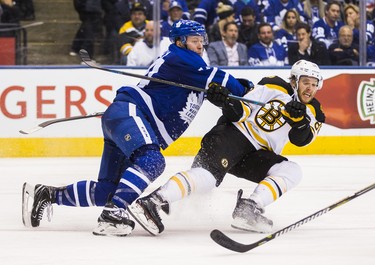 Toronto Maple Leafs Morgan Rielly during second period Round 1 Game 4 playoff action against the Boston Bruins David Pastrnak at the Air Canada Centre in Toronto, Ont. on Thursday April 19, 2018. Ernest Doroszuk/Toronto Sun/Postmedia Network