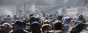 Smoke fills the air at a cannabis themed gathering at 420 Toronto 2018 at Nathan Phillips Square in Toronto, Ont.  on Friday April 20, 2018. Ernest Doroszuk/Toronto Sun/Postmedia Network