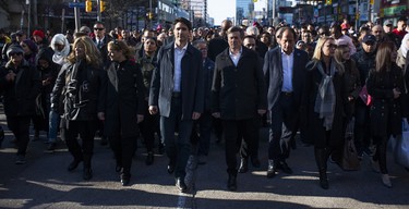 Canadian Prime Minister Justin Trudeau and Toronto Mayor John Tory make their way down Yonge St. to the #TorontoStrong Vigil at Mel Lastman Square in Toronto, Ont. on Sunday April 29, 2018. Ernest Doroszuk/Toronto Sun/Postmedia Network