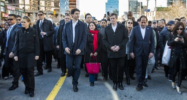 Canadian Prime Minister Justin Trudeau and Toronto Mayor John Tory make their way on Yonge St. to the #TorontoStrong Vigil at Mel Lastman Square in Toronto, Ont. on Sunday April 29, 2018. The event brought people together following the van attack that left 10 people dead. Ernest Doroszuk/Toronto Sun/Postmedia Network