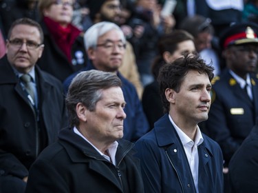 Toronto Mayor John Tory and Canadian Prime Minister Justin Trudeau at the #TorontoStrong Vigil at Mel Lastman Square in Toronto, Ont. on Sunday April 29, 2018. The event brought people together following the van attack that left 10 people dead. Ernest Doroszuk/Toronto Sun/Postmedia Network