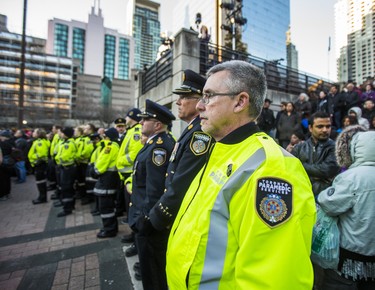 Toronto Paramedics at the #TorontoStrong Vigil at Mel Lastman Square in Toronto, Ont. on Sunday April 29, 2018. The event brought people together following the van attack that left 10 people dead. Ernest Doroszuk/Toronto Sun/Postmedia Network