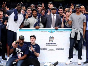 Kyle Lowry joins members of the NCAA champion Villanova Wildcats for a celebration photo on April 2, 2018