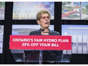Ontario Premier Kathleen Wynne announces cuts to hydro rates on average of 25 per cent during a press conference in Toronto, Ont., on Thursday, March 2, 2017.
