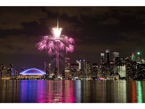 Fireworks explode over the Toronto skyline, during the opening ceremonies for the Pan Am Games, Friday, July 10, 2015. The quick-to-Tweet American president's recent flurry of posts attacking Amazon.com raises the political stakes in the tech titan's consideration of Toronto, the only non-American city shortlisted, for its second headquarters.