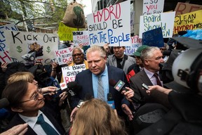 Ontario Progressive Conservative leader Doug Ford holds a rally to speak about Hydro One in Toronto on Tuesday, May 15, 2018. (Aaron Vincent Elkaim/THE CANADIAN PRESS)