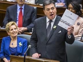 Ontario Finance Minister Charles Sousa delivers the provincial budget on March 28, 2018, as Premier Kathleen Wynne looks on. (ERNEST DOROSZUK, Toronto Sun)