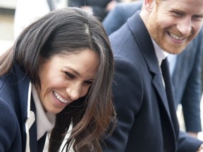 In this file photo dated Thursday March 8, 2018, Britain's Prince Harry and his fiancee Meghan Markle arrive for an event for young women, as part of International Women's Day in Birmingham, central England. (AP Photo)