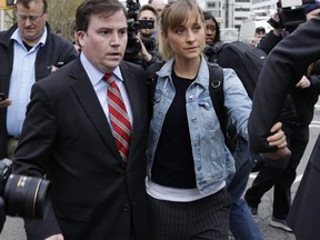 Former Smallville star Allison Mack outside a New York courthouse.