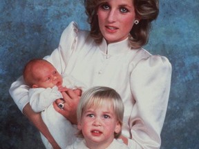 This 1984 file photo shows Princess Diana with sons Prince William, foreground, and Prince Harry. (AP PHOTO)