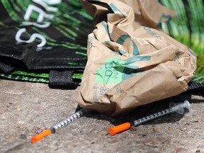 Needles and trash located near Toronto Public Health's safe injection site at Dundas and Victoria Sts. (Dave Abel, Toronto Sun)