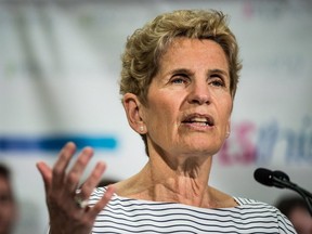 Kathleen Wynne is pictured during a campaign stop at Sick Kids Hospital in Toronto on May 10, 2018. THE CANADIAN PRESS/Aaron Vincent Elkaim ORG XMIT: AVE105  Kathleen Wynne;