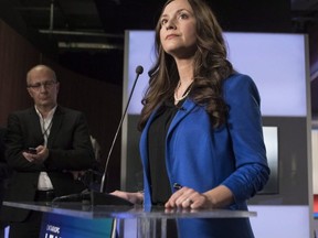 Tanya Granic Allen is pictured answering questions from reporters at a PC leadership debate in February. (THE CANADIAN PRESS)