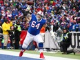 Richie Incognito of the Buffalo Bills spikes the ball after LeSean McCoy of the Buffalo Bills scored a touchdown during the first quarter against the Miami Dolphins on December 17, 2017 at New Era Field in Orchard Park, New York. (Tom Szczerbowski/Getty Images)