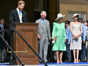 Prince Harry, Duke of Sussex, pays tribute to his father Prince Charles during the Prince of Wales' 70th Birthday Garden Party at Buckingham Palace on Tuesday, May 22 2018.
Dominic Lipinski/AFP/Getty Images