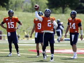 Toronto Argos QB James Franklin QB gets in some reps with Dakota Prukop (9) McLeod Bethel-Thompson (14) and Ricky Ray (15) during practice in Toronto Wednesday May 30, 2018. (Jack Boland/Toronto Sun)