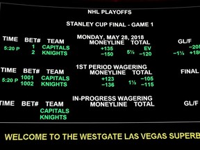 The betting line for Game One of the Stanley Cup Final shows the Vegas Golden Knights favoured over the Washington Capitals at the Race & Sports SuperBook at the Westgate Las Vegas Resort & Casino in Las Vegas on May 23, 2018.