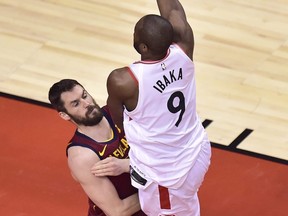 Toronto Raptors forward Serge Ibaka (9) picks up an offensive foul on Cleveland Cavaliers guard Jose Calderon (81) during first half second round NBA playoff basketball action in Toronto on Tuesday, May 1, 2018. THE CANADIAN PRESS/Frank Gunn