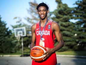 R.J. Barrett poses for a photograph outside his home in Mississauga, Ont., on July 20, 2017. The Canadian was named the Gatorade national boys basketball player of the year on Thursday. (The Canadian Press/Nathan Denette)