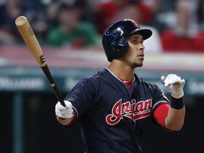 Michael Brantley of the Cleveland Indians hits a grand slam off Keone Kela of the Texas Rangers during the ninth inning at Progressive Field on May 1, 2018 in Cleveland, Ohio. (RON SCHWANE/Getty Images)