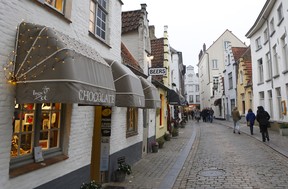 Expect to be tempted by the smell of chocolate wafting through the streets from shops like this one in Bruges while in Belgium.