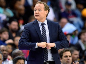 In this April 6, 2018, file photo, Atlanta Hawks coach Mike Budenholzer gestures during the second half of the team's NBA basketball game against the Washington Wizards in Washington.  (AP Photo/Nick Wass, File)