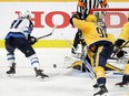 Winnipeg Jets left wing Kyle Connor scores a goal against the Nashville Predators during the second period in Game 5 of an NHL hockey second-round playoff series Saturday, May 5, 2018, in Nashville, Tenn. (AP Photo/Mark Humphrey)