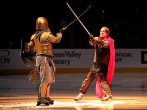 The Golden Knight performs with the Washington Capitals swordsman prior to Game 1 of the Stanley Cup final at T-Mobile Arena on May 28, 2018 in Las Vegas. (Bruce Bennett/Getty Images)