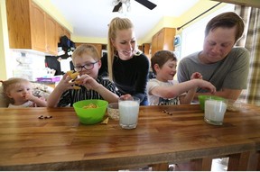 The Larocque family from Tottenham Ontario — Joshua (blue shirt) and his brother Andre (white shirt) with their mom Sasha, dad Jamie, and sister Lucy — are seen here in a 2018 Sun file photo. 2018. Jack Boland/Toronto Sun/Postmedia Network