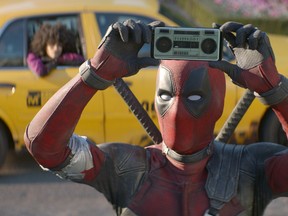 This image released by Twentieth Century Fox shows Ryan Reynolds in a scene from "Deadpool 2." (Twentieth Century Fox via AP, File)
