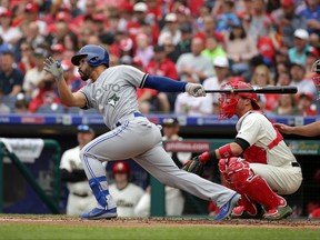 Devon Travis of the Toronto Blue Jays hits a two-run double in the second inning during a game against the Philadelphia Phillies at Citizens Bank Park on May 27, 2018 in Philadelphia, Pennsylvania. (Hunter Martin/Getty Images)