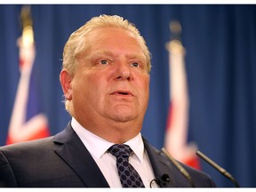 PC Leader Doug Ford speaks to media a the Double-Tree by Hilton Hotel in Mississauga, Ont. on Thursday May 10, 2018. Dave Abel/Toronto Sun/Postmedia Network